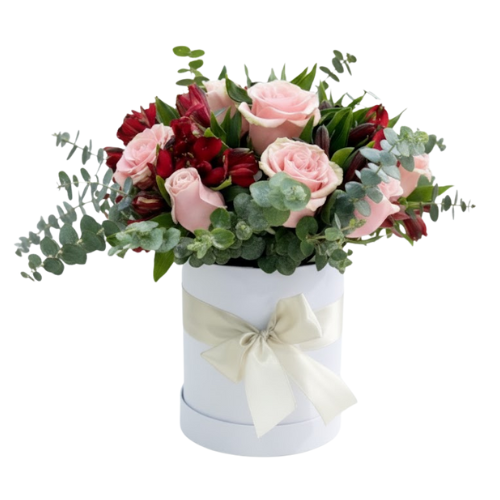 Arreglo floral con rosas en tonos suaves entregado como regalo de cariño en un ambiente familiar en Bogotá.